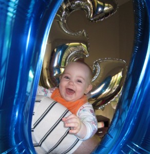 Evie looking through a mega-balloon