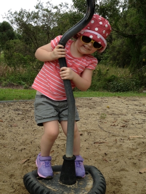 Evie Lattimore - Spinning Pole At Kids Playground