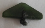 Triangular jade locking clasp for a Maori tribal necklace
