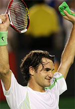 Roger Federer celebrating after claiming the 2006 Australian Open title